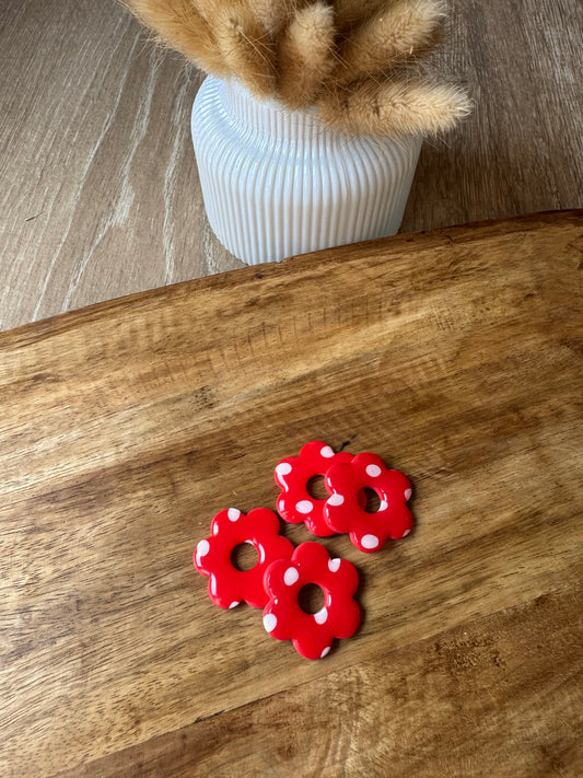 Flora rouge et petit pois